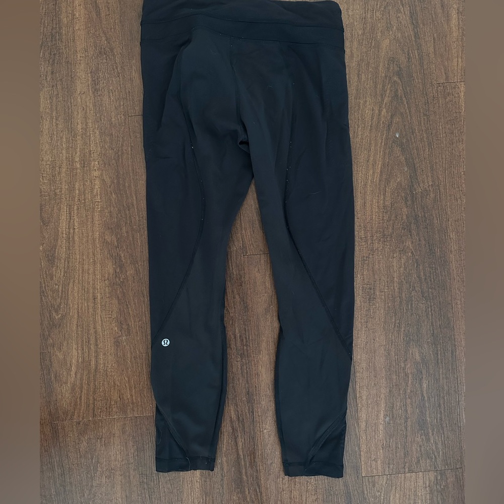 Lululemon inspire crop mesh front, front pockets